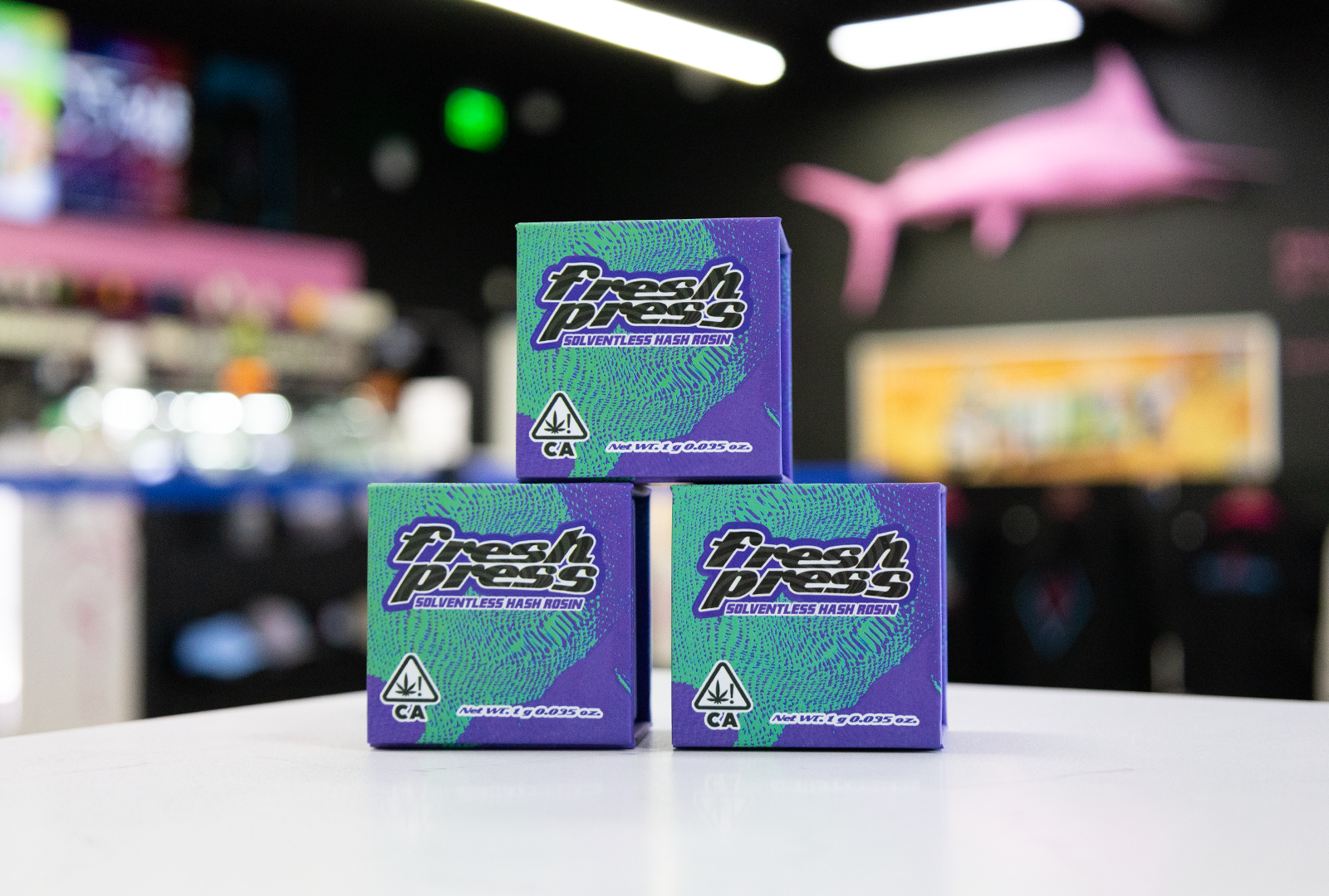 3 packages of Fresh Press concentrates on a counter.